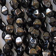 5mm Black/Gold Luster Pinched Oval Beads [100]